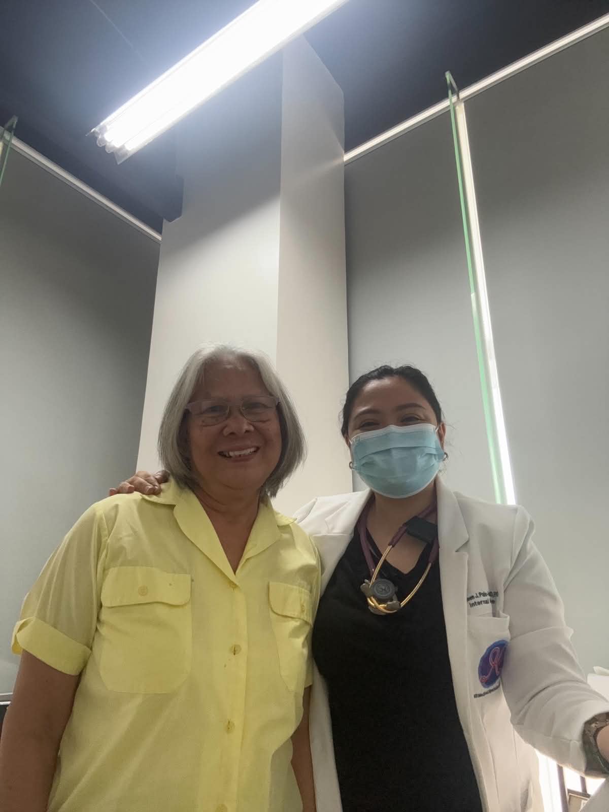 Doctor with patient at Health Plus