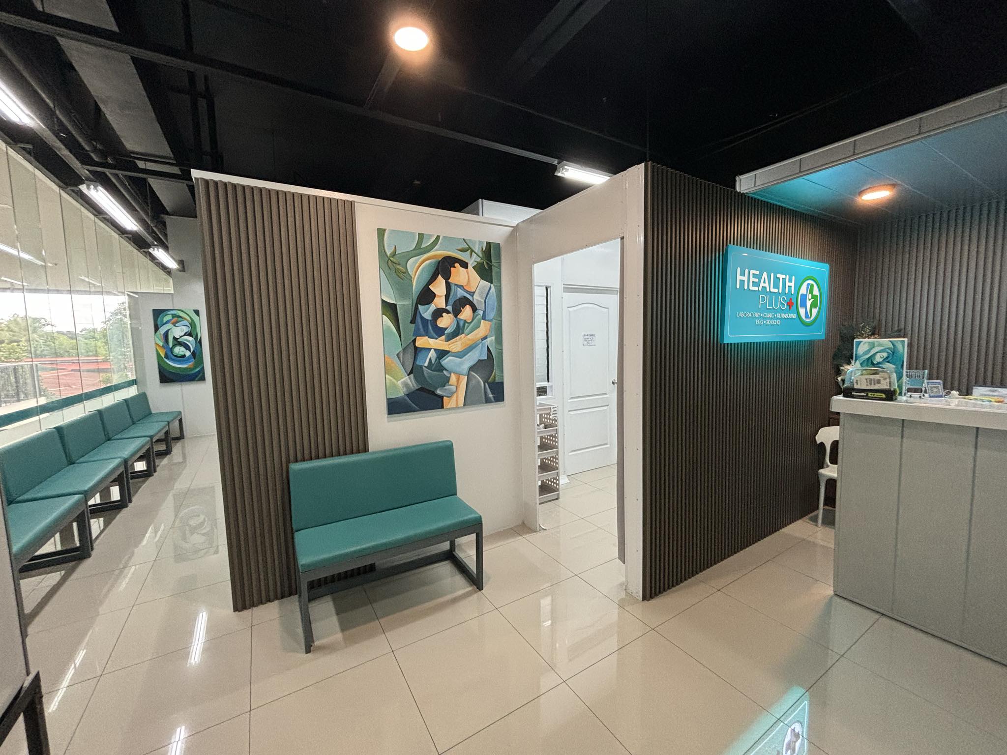 Modern Health Plus clinic waiting area with comfortable seating